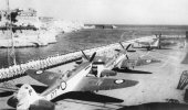 HMS Triumph with Supermarine Seafires on the flight deck in the late 1940s.jpg HMS Triumph with Supermarine Seafires on the flight deck in the late 1940s.jpg