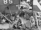 0099935-WORLD-WAR-II-D-DAY-1944-US-Coast-Guard-landing-craft-listing-and-sinking-after-taking-...jpg
