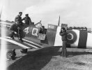 VCS-7_mechanics_with_Spitfire_at_Lee-on-Solent_June_1944.jpg