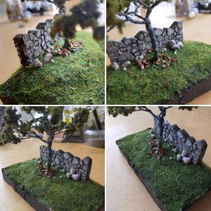 Tree, grass and brick wall.